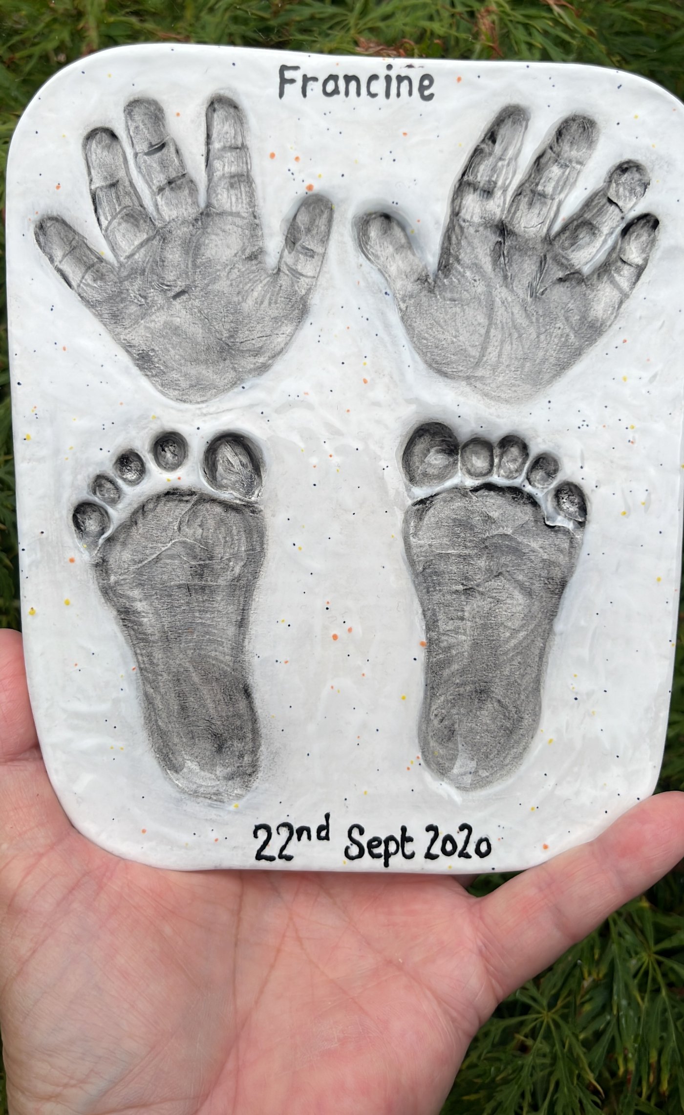 Painted ceramic baby hand and footprints