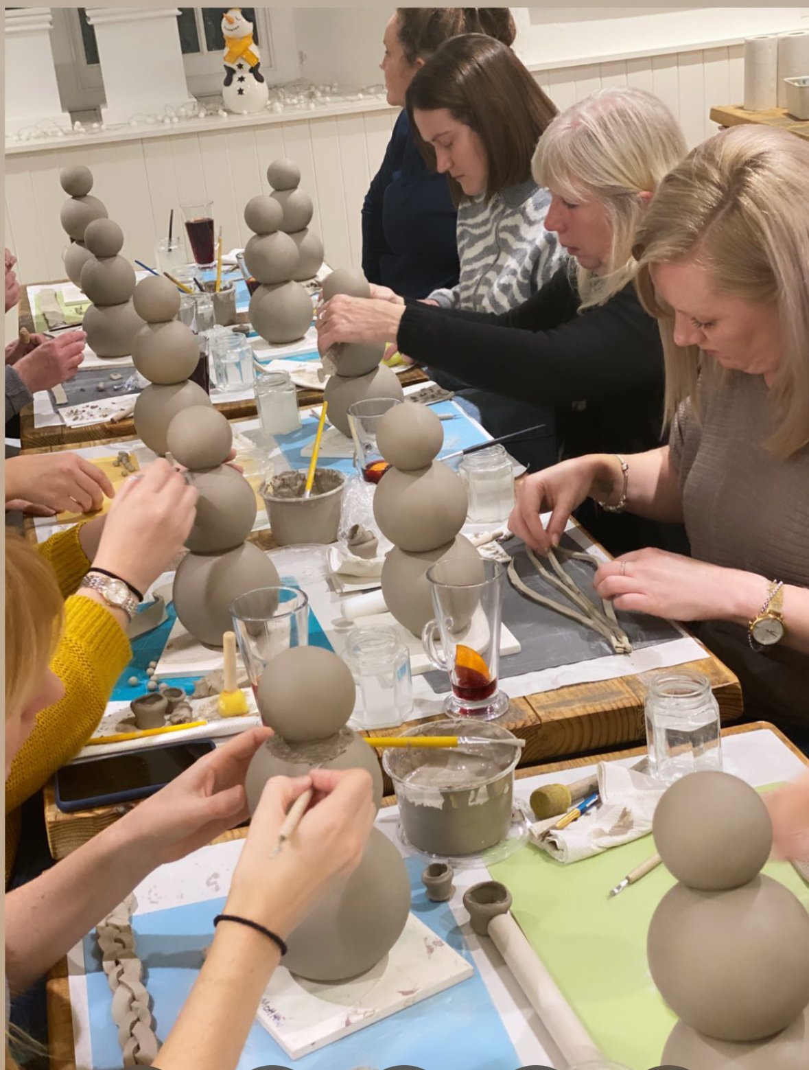 A workshop class around the big table